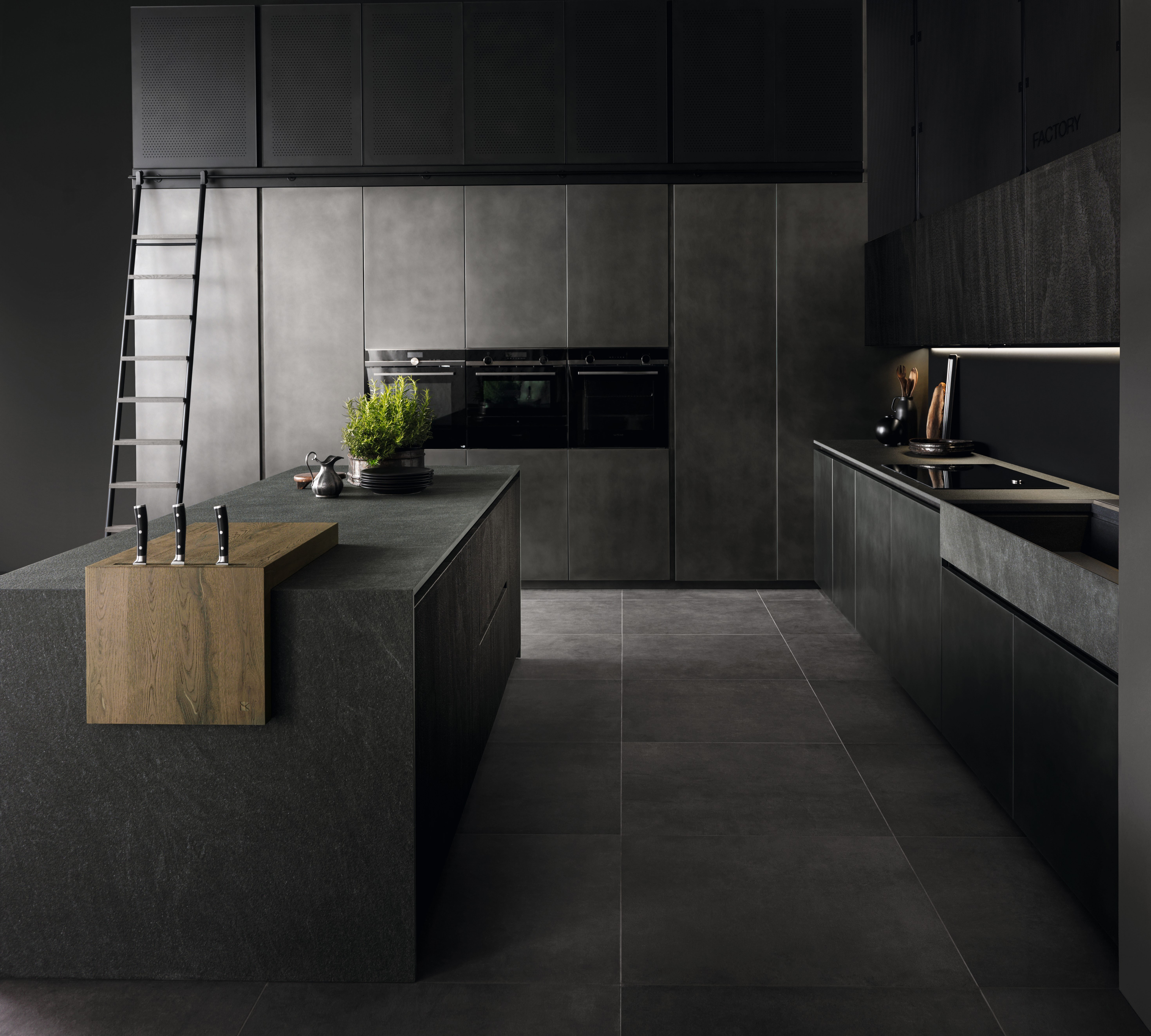 Aster Factory mood — industrial-loft kitchen